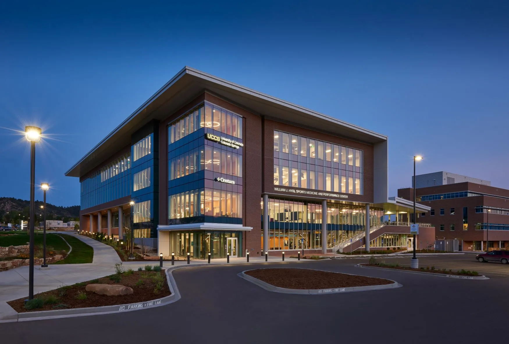 Dusk outside of the William J. Hybl Sports Medicine and Performance Center