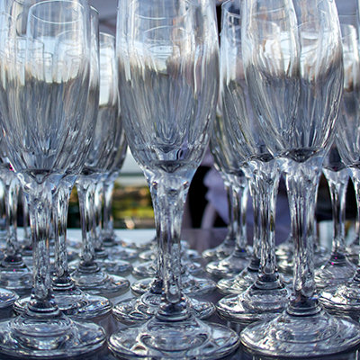 a picture of empty glass goblets on a table